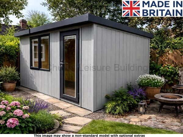 Royal Bletchley 8x8 Garden Room 1 A grey Royal Bletchley pent garden room with a black door and windows. A beautiful garden surrounds the shed.