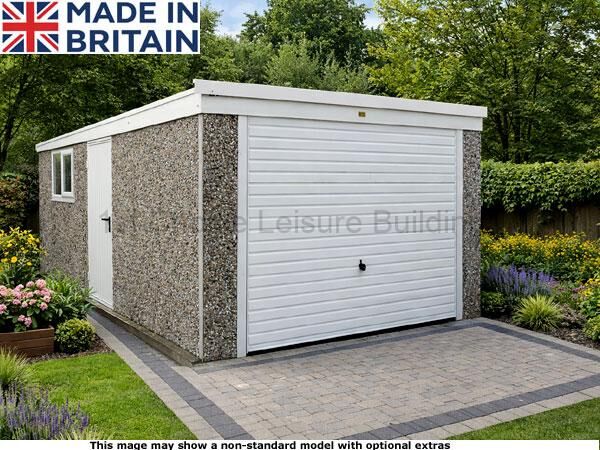 Lidget Pent Concrete Garage Includes Free Installation. Image Shown May Include Non-Standard Options This image shows a Lidget pent concrete garage with a large white garage door and a small window on the side. The shed is made of grey stone effect panels and has a white roof. It is situated on a drive in a well-manicured garden.