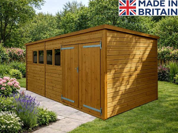 A heavy-duty workshop with double doors and three windows. The shed is made of light-coloured wood.