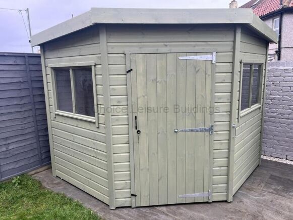 Eversley Corner Shed 1 Sapphire 8ft x 8ft Eversley Corner Shed shown stained externally SSEV2