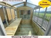 Platinum Herriard Greenhouse 3 Greenhouse interior with wooden floor and bench