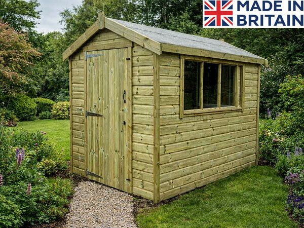 A pressure-treated wooden shed with a window and door. Free assembly included.