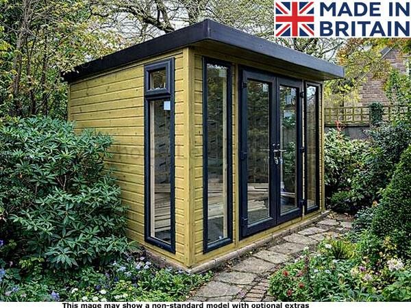 Royal Buckingham Garden Room 1 A small yellow garden shed with black trim and large glass doors and windows. The shed is surrounded by lush greenery and flowers.