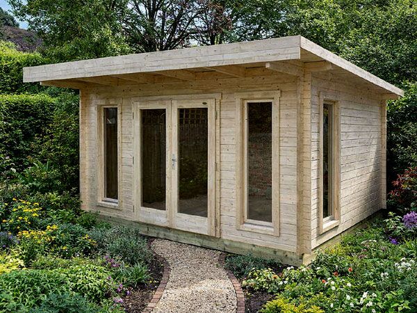 A wooden log cabin under 2.5m tall with large double doors and windows.