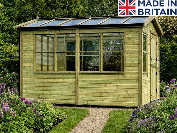 Wooden Platinum Hawthorn Greenhouse with glass roof panels.