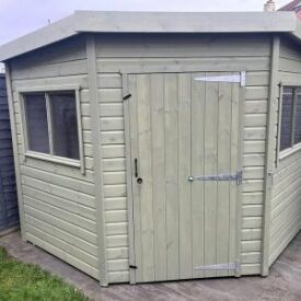 Sapphire 8ft x 8ft Eversley Corner Shed shown stained externally