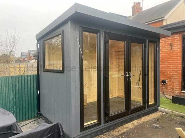 From Sketch to Sanctuary: How Custom-Fitted Garden Rooms Transform Your Outdoor Space 3 Modern Grey Garden Room With Large Windows And Double Doors.