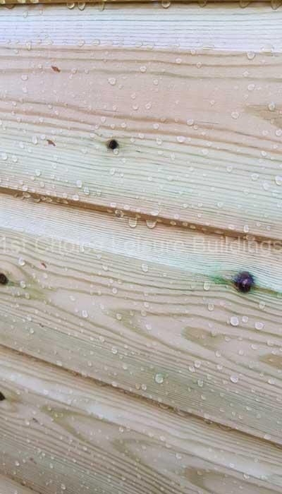 DIY Weatherproofing: Step-by-Step Guide for Wooden Garden Buildings 11 Treated cladding.