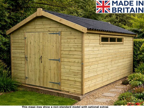 A timber garden workshop with an open door and windows, situated in a wooded area. The shed features a brown roof and a concrete base.