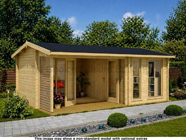 Mayford Apex Garden Cabin 1 A modern wood log cabin with a black roof and large windows, surrounded by a well-manicured lawn and garden.