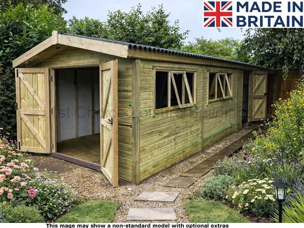 Fareham Apex 1 A wooden garden garage with open doors and windows, surrounded by a beautiful garden.