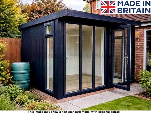 Royal Marlow 10x10 Garden Room 1 A Royal Marlow garden room modern garden room with large glass panels and a door. A green barrel sits to the side.