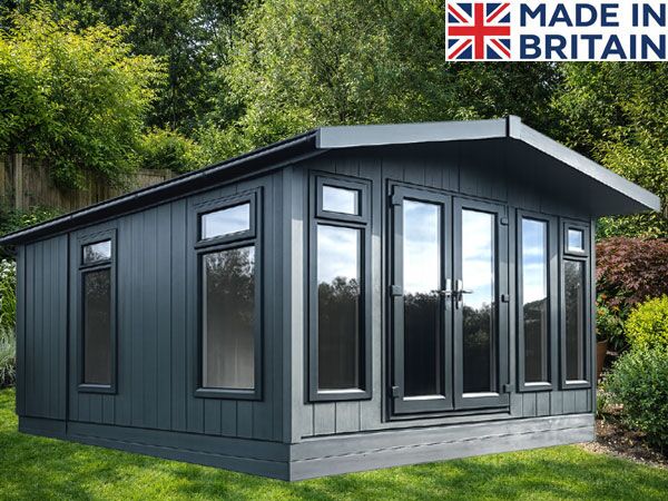 A modern grey garden room with large windows and a door. Perfect for a garden office or relaxation space.