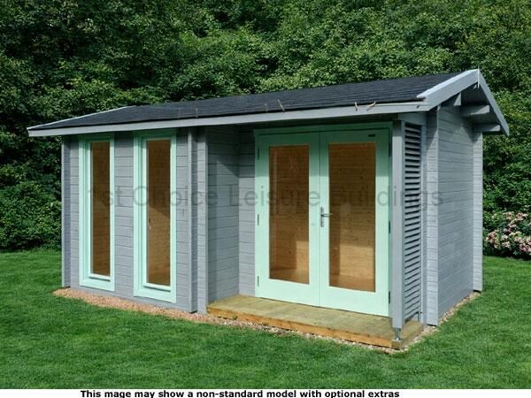 Haslemere Apex Cabin 1 A grey painted log cabin with mint green trim and a black roof. The shed has two large double doors and three tall windows.